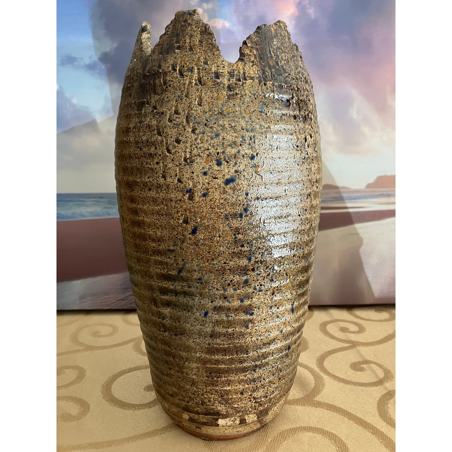 Shiwan pottery vase adorned with deep red cherry and green vines