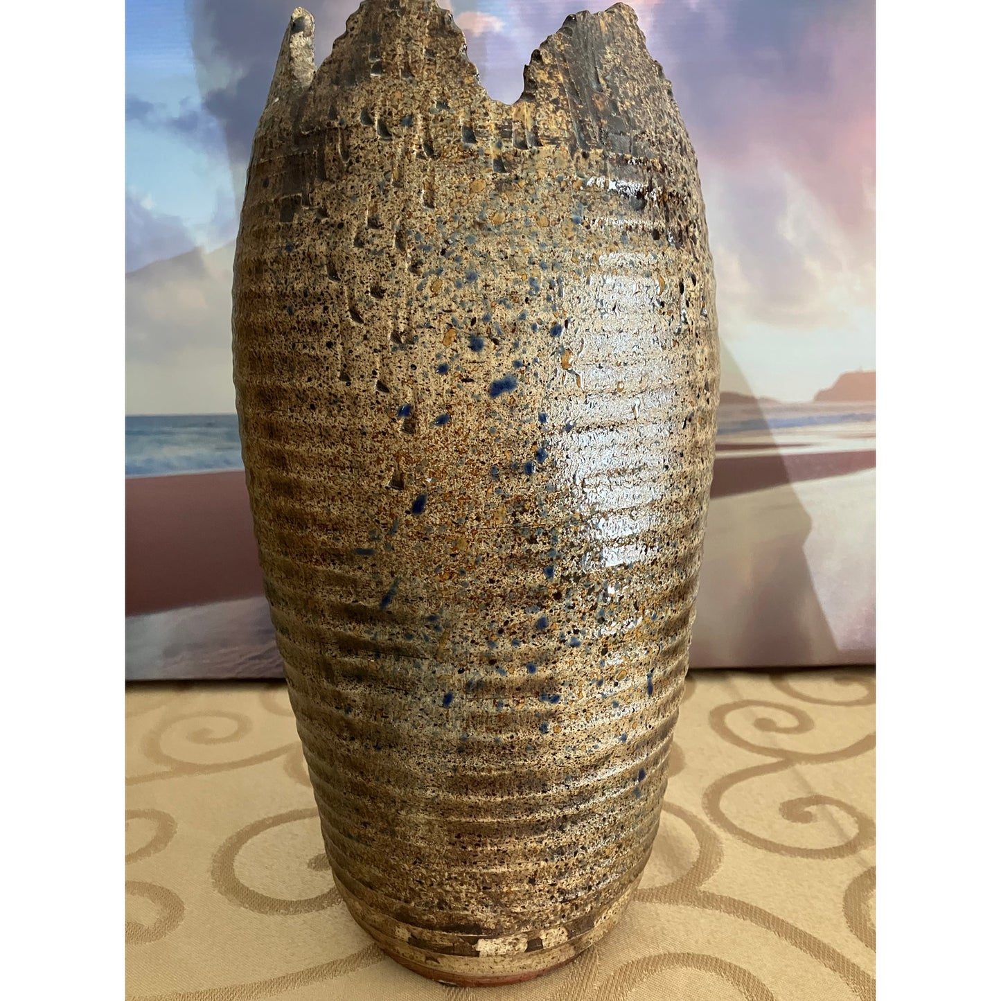 Shiwan pottery vase adorned with deep red cherry and green vines